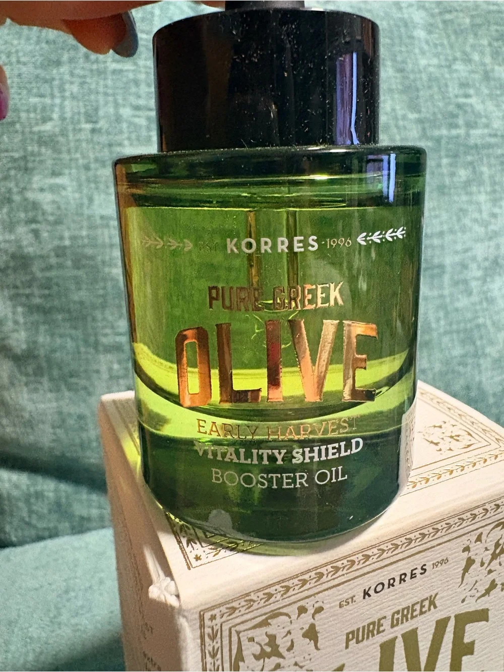 Korres Pure Greek Olive Vitality Shield Booster Oil — green and black